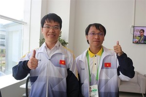 Le Quang Liem (L) and Nguyen Ngoc Truong Son (Photo: Huu Binh)