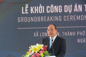 Vietnamese Prime Minister Nguyen Xuan Phuc speaks at the  groundbreaking ceremony of the Long Son petrochemical project 