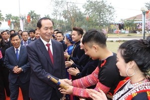 President Tran Dai Quang in the village (Source: VNA) 