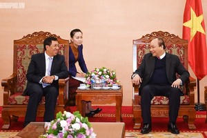 Vietnamese Prime Minister Nguyen Xuan Phuc and Governor of the Bank of the Lao People's Democratic Republic Sonexay Sitphayxay (Photo:VGP)