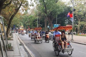 Foreign visitors in Vietnam (Photo: VNA)