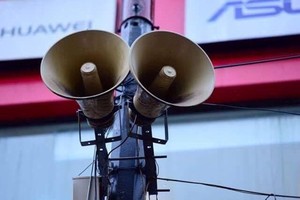 Loudspeakers have been providing information about how to prevent COVID-19 from spreading. VNA/VNS Photo Minh Son