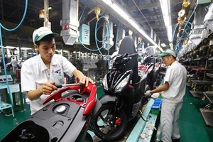The national programme is considered a new push to support enterprises in the context of the Fourth Industrial Revolution (Photo: vietq.vn)