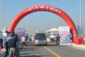 Phuoc Loc Bridge is put into operation on January 7. (Photo: SGGP/ Cao Thang)