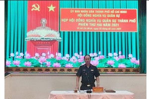 Major General Nguyen Van Nam, Member of the Standing Board of the Ho Chi Minh City Party Committee, Standing Deputy Chairman of the Ho Chi Minh City Military Services Council chairs the meeting 