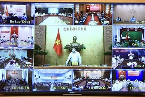PM Pham Minh Chinh chairs the online meeting (Photo: VNA) 