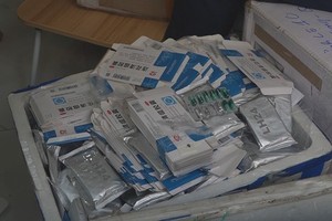 HCMC Police seize illicit batch of drug advertised to treat Covid-19 