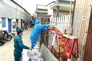  HCMC residents wholeheartedly joining hands in Covid-19 fight