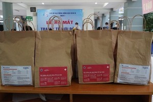 Medical bags support Covid-19 patients treated at home in HCMC