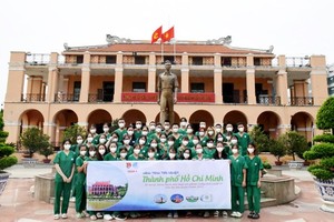 Doctors, medical staff visit HCMC Museum, Can Gio District