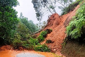 Flood-triggered landslide kills three people, leaves five missing