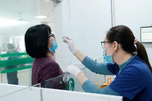 HCMC orders wearing masks in medical facilities to prevent flu