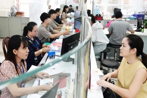 HCMC prepares to operate new wards, communes