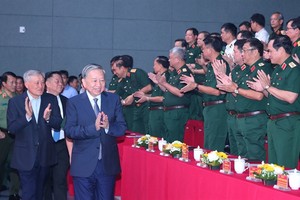 Party leader joins event marking army’s decade of following Uncle Ho's teachings