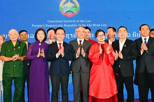 HCMC commemorates 50th National Day of Laos