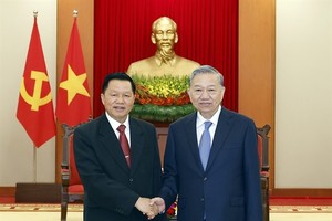 Party chief hosts Lao public security minister