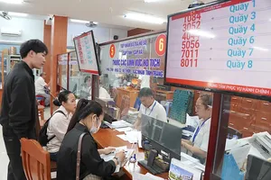 HCMC seeks solutions to remove IT workforce bottlenecks at communes, wards