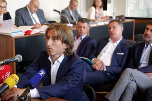 Modric tại phiên tòa. 