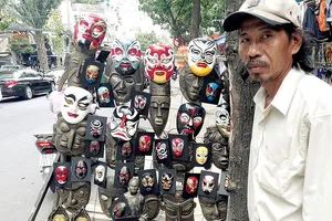 Người vẽ mặt thế nhân