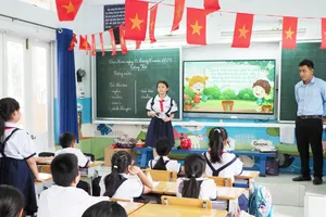 Học sinh Trường Tiểu học Đặng Trần Côn (phường Vĩnh Hội) trong một giờ học. Ảnh minh họa.