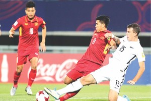 越南(紅衣)對新西蘭比賽一瞥。（圖源：互聯網）