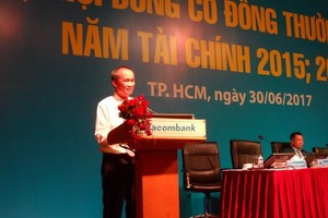 圖為新任董事長楊功明在Sacombank股東大會上發表講話。（圖源：互聯網）