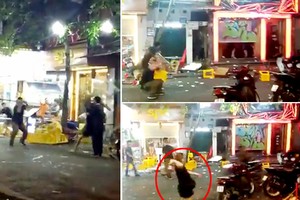 河內市還劍郡馬雲街某酒吧門前兩夥青年惡劣鬥毆。（圖源/拼圖：互聯網）