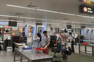 圖為機場安全檢查的一項必需手續。（示意圖源：C.T）