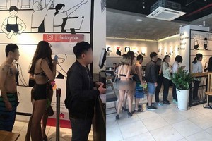 “穿比基尼顧客獲免費服務”酬賓方式的某奶茶店違規促銷受罰。