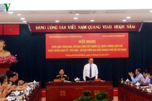 圖為中央軍委常務處與本市市委常務處昨(14)日舉行的會議現場一隅。（圖源：VOV）