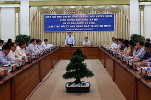 圖為政府副總理王廷惠主持的中央薪資、社保與優撫有功者政策改革會議現場一隅。