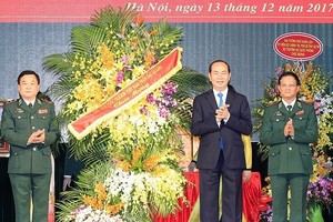 國家主席陳大光出席越南人民軍建軍日73週年紀念儀式。（圖源：越通社）