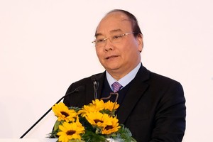 政府總理阮春福主持會議。（圖源：光孝）