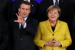 法國總統馬克龍與德國總理默克爾在近日的歐盟峰會上。（圖源：路透社）