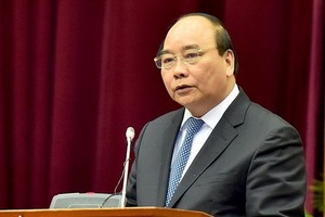 政府總理阮春福在會上致詞。