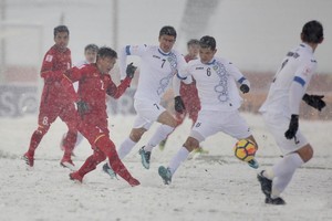 越南球員首次在雪地上比賽。（圖源：微博）