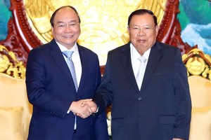 阮春福總理會見老撾總書記、國家主席本揚‧沃拉吉。（圖源：統一）