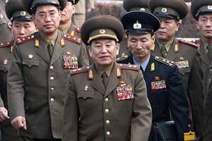 朝鮮勞動黨中央委員會副委員長金英哲(中)。（圖源：AFP）