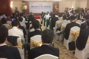 市房地產協會與日本海外生態城項目協議會(J-CODE)配合舉行的“整飭和發展胡志明市都市”研討會現場一隅。（圖源：海洋）