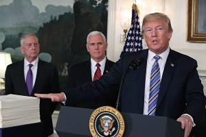 美國總統特朗普當地時間23日簽署了1.3萬億美元的政府預算案，避免美國政府今年再次關門。(圖源：Getty Images)