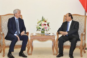 阮春福總理接見美國摩根大通集團主席戴蒙。（圖源：統一）