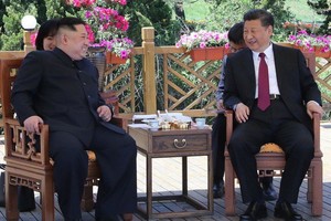 時隔40餘日，習近平同金正恩再次會晤。（圖源：新華網）