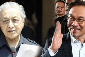 馬哈蒂爾（左）和安瓦爾。（圖源：星洲網）