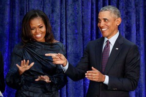 美國前總統奧巴馬和夫人米歇爾將為奈飛公司（Netflix）製作影視作品。 （圖源：路透社）