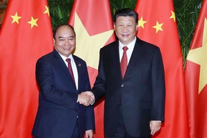 政府總理阮春福與中國國家主席習近平在會見中討論多項問題。（圖源：越通社）