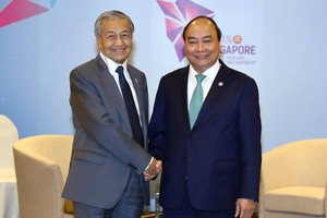 阮春福總理會見馬來西亞首相馬哈迪。（圖源：VGP）