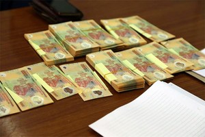 被沒收的假鈔。（圖源：楊絨）