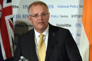 澳總理莫里森宣佈，被定罪為恐怖份子的澳大利亞人如果擁有雙重國籍，將會自動被剝奪澳大利亞公民身份。（圖源：AFP）