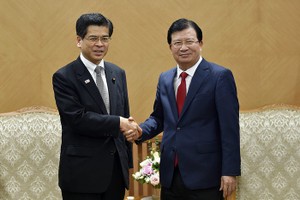 政府副總理鄭廷勇（右）接見日本國土交通大臣石井啟一。（圖源：日北）