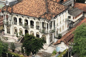 位於本市第三郡武文秦街110-112號的古老別墅。